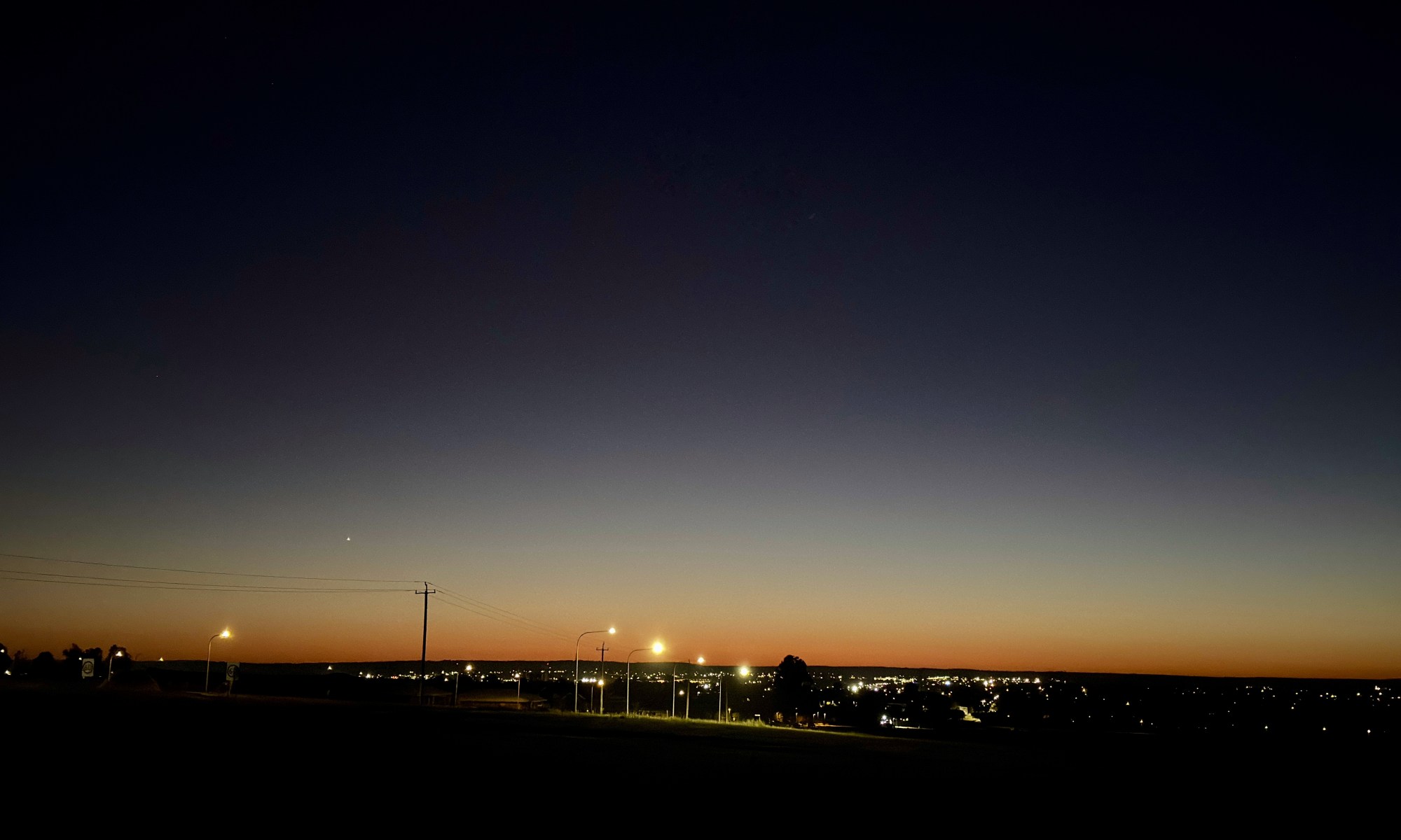 A photo of the lights of Dubbo City at pre-dawn.